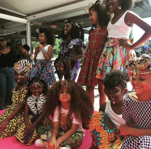 Farouk James pictured along side of other natural hair models 